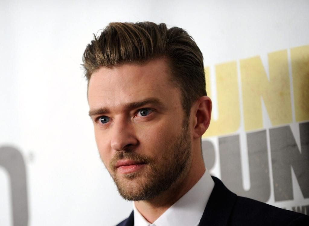 Justin Timberlake arrives at the world premiere of Twentieth Century Fox and New Regency's film "Runner Runner"