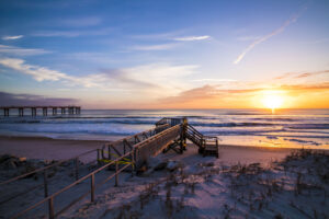 Sunrise over a life guard tower in st. augustine